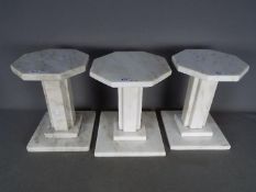Three marble plinths, each having octagonal top, approximately 30 cm (h).