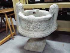 Garden Stoneware - a reconstituted stoneware twin-handled planter on pedestal base,