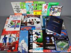 Football Programmes. A box of big match programmes from the 1960s onwards.