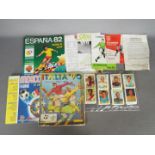 Lot to include a complete Italia 90 World Cup sticker album (Yugoslavian issue), taped,