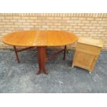 Lot to include a drop leaf table, approximately 75 cm x 25 (159) cm x 91 cm and a bedside cabinet,