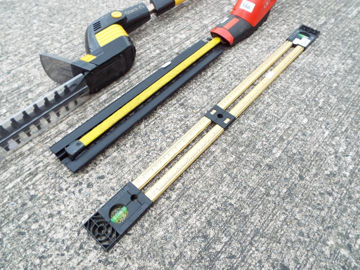 Two hedge trimmers, one by Gtech and a spirit level. - Image 4 of 4