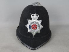 A vintage policeman's helmet