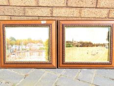 Two framed oil on board riverside landscape scenes,