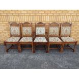 Four upholstered dining chairs and one c