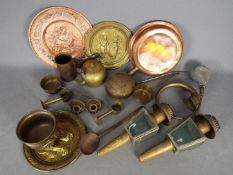 A quantity of metalware, brass and coppe