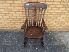 A traditional rocking chair.