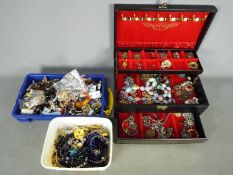 A Very Large Quantity Of Costume Jewellery - To include beads, necklaces, brooches, paired earrings,