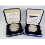 Two silver proof coins comprising Alderney 1999 Total Solar Eclipse £5 and 2000 Millennium £5,