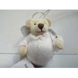 Janis Presbury / Waldron - Silver Angel Teddy Bear. Label. high 9cm.