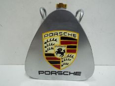 White metal Petrol can with brass screw lid, marked Porsche Stuttgart. 34cm high.