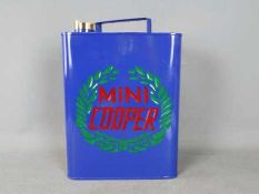 A blue Mini Cooper petrol can,