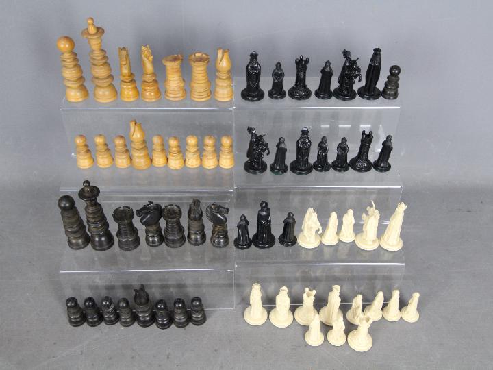 Two chess sets to include a St George pattern example with 10 cm king and one other.