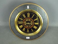 A mid-19th century French vineyard wall clock, circular brass and painted dial,