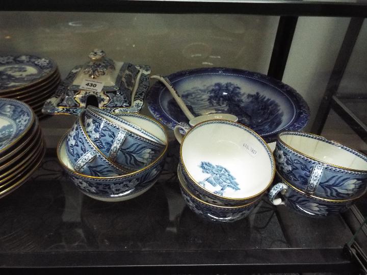 A quantity of blue and white dinner and tea wares to include Wedgwood and Wood & Sons and a small - Image 4 of 4