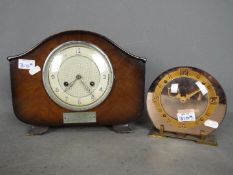 A Bentima oak cased, 8 day mantel clock, with pendulum and one other clock.