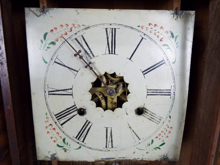 An American 30 hour wall clock by E N Welch, Roman numerals to a white dial. - Image 2 of 6