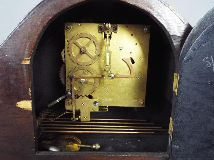 A mantel clock, Arabic numerals to a silvered chapter ring, with key and pendulum. - Image 4 of 6