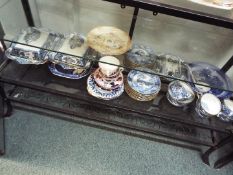 A quantity of blue and white dinner and tea wares to include Wedgwood and Wood & Sons and a small