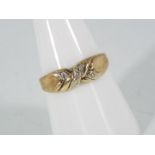 A 9ct gold and diamond set ring, size O, approximately 1.7 grams all in.