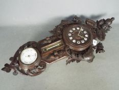 A Late 19th century decorative cartel style wall clock compendium,