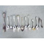A collection of hallmarked silver cutlery, various assay and date marks,