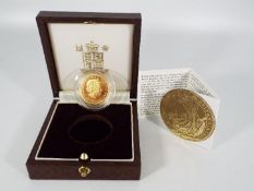 A 1999 ¼ Ounce Britannia gold proof coin (approximately 8.