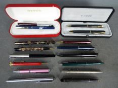 A collection of pens to include Sheaffer, Parker,