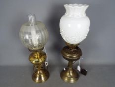 Two converted oil lamps, largest approximately 55 cm (h).