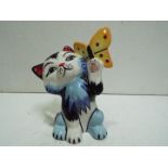 Lorna Bailey "Cat + Butterfly" - Stylistic cat with a butterfly in its raised paw. Multicoloured.