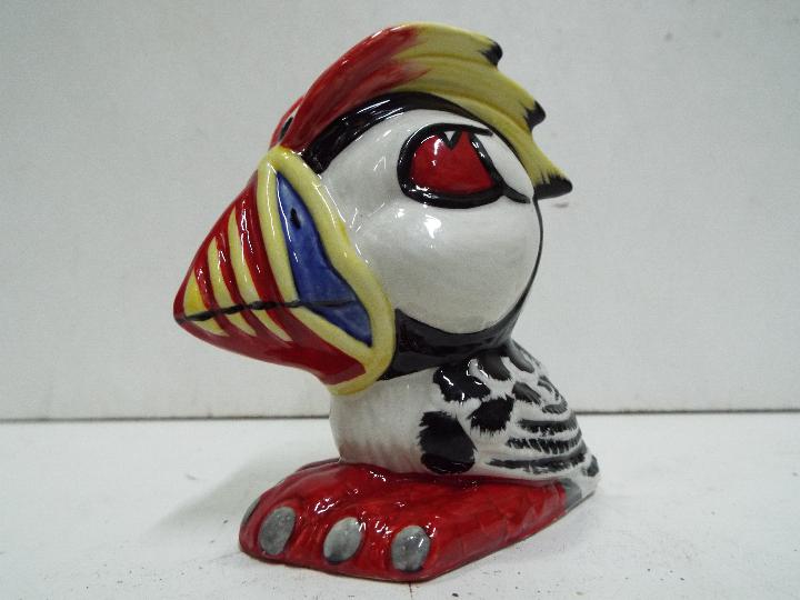 Lorna Bailey "Puffin" - Stylistic bird. Multicoloured. Signed by artist in black on base. 9.