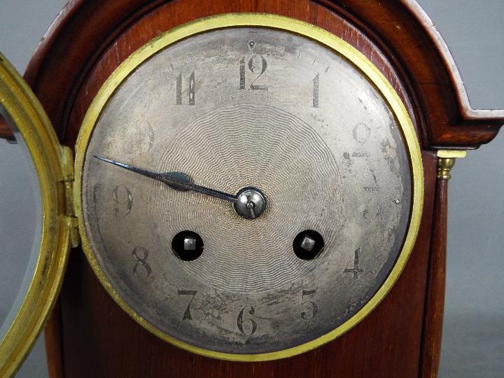 A French arch top mantel clock, Arabic numerals to a white metal, engine turned dial, with key, - Image 2 of 6