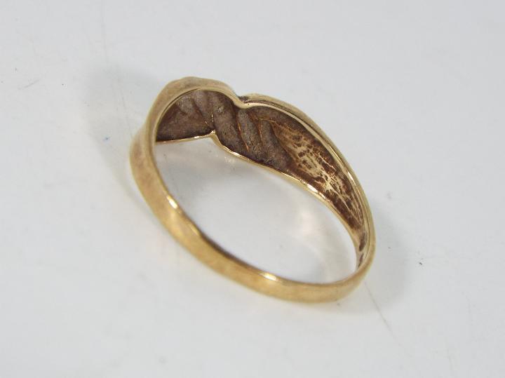 A 9ct gold and diamond set ring, size O, approximately 1.7 grams all in. - Image 3 of 5