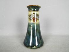 A Royal Doulton stoneware vase of tapered form with floral decoration,