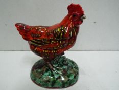 Anita Harris "Red Hen" - Green naturalistic base. Stamped Stoke on Trent. Hand painted.