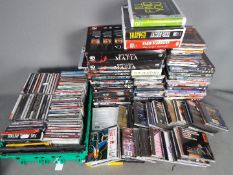 A collection of CD's and DVD's.