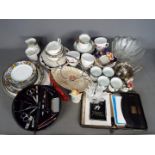 A collection of mixed tea wares to include Sutherland China, Colclough, Wade and similar,
