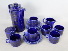 A Hornsea Pottery blue glaze 'Heirloom' pattern coffee service comprising coffee pot and cover,