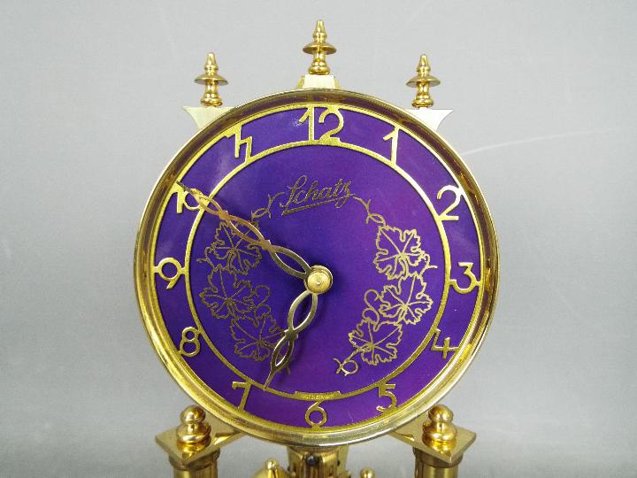 A Schatz 49 ‘Rosenthal’ model 400-day torsion clock in dark blue porcelain with decorative gilded - Image 2 of 7