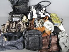 A quantity of handbags and belts.