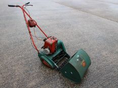 A Suffolk Super Colt petrol, cylinder lawnmower.