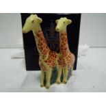 Royal Crown Derby - Giraffes. Multicoloured with Gold highlights.