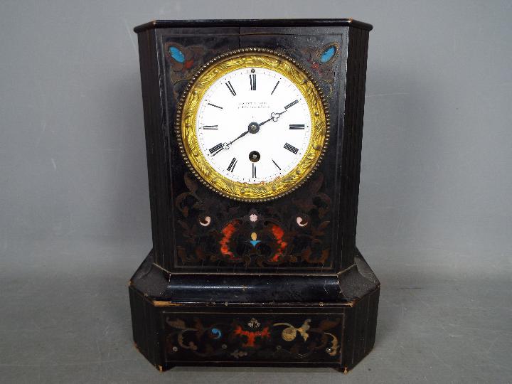 A wood cased mantel clock, marked to the dial Brocot A Paris r.