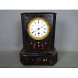 A wood cased mantel clock, marked to the dial Brocot A Paris r.