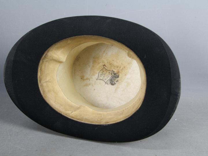 A leather top hat box containing a T Crick, Bury top hat, - Image 5 of 8