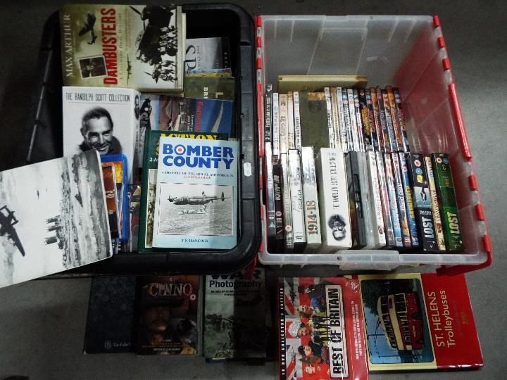 Job lot - A collection of books, DVD's and CD's, many military related, two boxes.