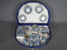 A vintage MAS R Capodimonte coffee set contained in original box.