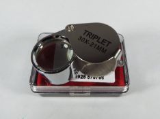 A Jeweller's Loupe, 30 x magnification,