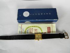 A vintage wristwatch marked Junghans