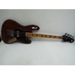 Bass Guitar - Vintage full size wooden instrument with no visible makers mark.